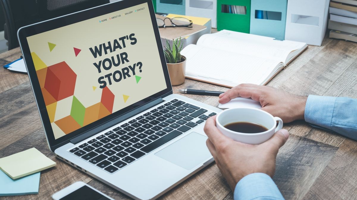 Laptop on which a website with the title “What's your Story” is displayed.